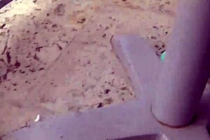 kiki daire conceals food under traditional attire in the shop