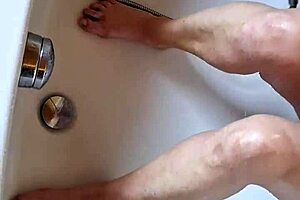 washing dirty feet in the bathtub, so relaxing