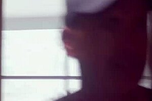 Lazy French maid cleans bedroom