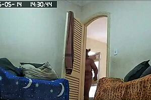 Hidden camera catches the maid cleaning naked at home.