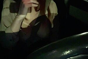 Artemisia Love flashes big tits during night car ride