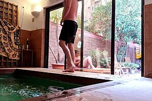 my stepson takes out his big cock on the terrace gets excited looking at me behind the window and showing his erection to the neighbors my nipples are very hard and im not wearing a bra