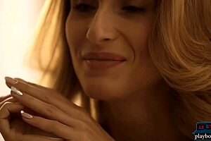 Blonde cougar Cara Mell strips lingerie and poses solo.