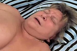 You won't believe how hot this mature granny fucks hard