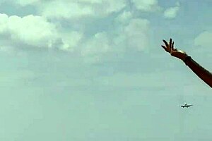 monika fox poses beautifully in a pink bikini on the beach