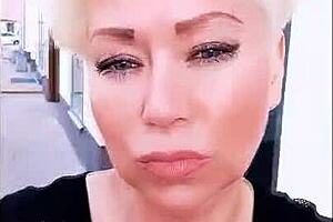 My wife performs as a mature webcam model with shaved pussy.