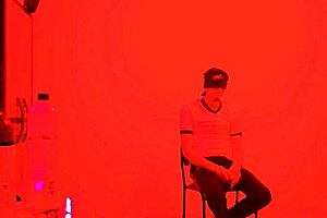 Scruffy Man Invites Exhibitionists to Exclusive Catwalk