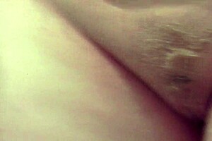 Sexy milf Frina shaves her hairy pussy again in the bathroom, fingering and masturbating