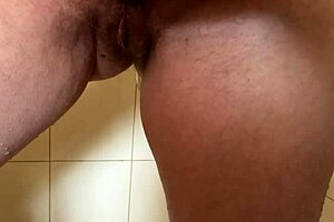 He can’t resist playing with my hairy pussy while I shower. It’s a steamy European fetish.