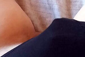 Gretala sensually poses in her black slip