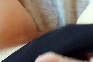 Gretala sensually poses in her black slip