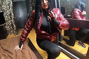 Nympho wife plays with camel-toe jumpsuit, adds cum to shiny red down-jacket.