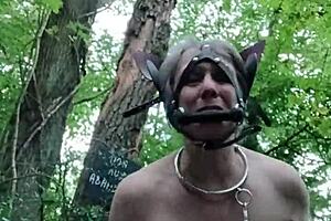 sexy ponygirl slave moans during bondage in forest