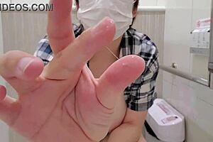 Married woman masturbates in store toilet