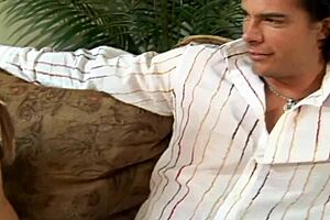 Holly Wellin grins and bares it in fishnets and lingerie