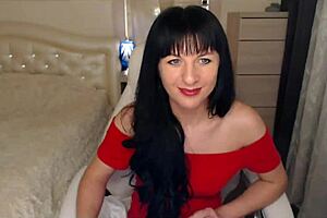 Watch Helga Muah striptease in red, undressing to show perky small tits