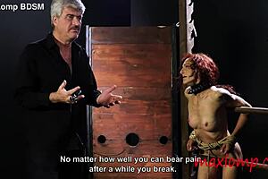 Redhead Milf Screams During Intense Caning Session