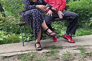 Hot Milf Jerks Off A Big Dick Into A Glass In The Park On A Bench