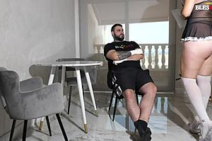 disabled man gets assistance from helpful maid in the house