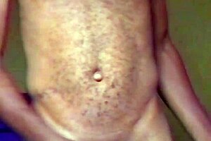 Lonely African man gropes himself after naked dance