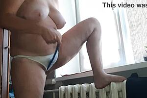 Stepmom masturbates to orgasm in panties.