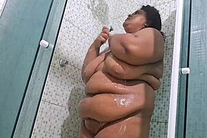 caught neighbor in the bath having a big squirt, her big tits on display