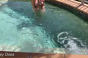 A daring wife flashes her boobs in the hotel pool during an exhibitionist adventure.