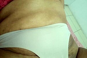 Spoiled mother-in-law massages her wet pussy, screaming from excitement.