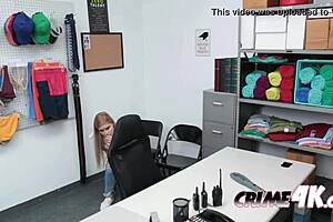 The officer is working in the security office with colleagues