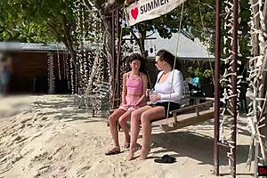 Stepmom and stepdaughter picked up on beach for risky public handjob, ending with cum on face.