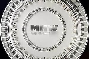 Maxine X performs an intense blowjob on Scott Rhodes