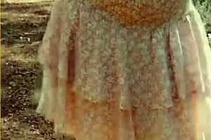 Wifey changes her shirt in the outdoors. She exposes shaved pussy and tits fully.