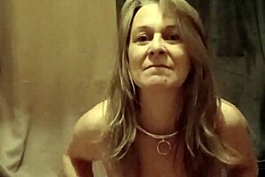 slave girl does striptease outdoors