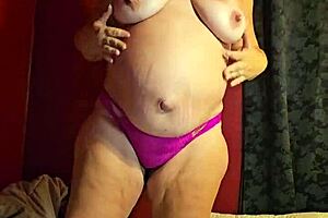 Pregnant MILF Strips Teasingly?