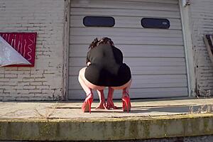 Is this mature wife flashing her asshole while walking the docks bottomless?