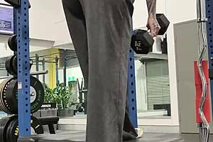 Milf enjoys her gym life with huge tits and tattooed ass in leggings