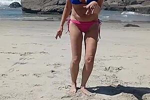 A milf goes nude in public outdoor setting