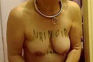 chained slave feels humiliation in public