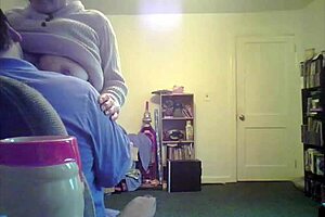 Loris shows titties in the living room setting.