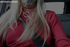 Blonde exhibitionist flashes pussy in car at mall parking lot