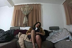 in a cozy setting she explores soft furs and down jackets alongside her intriguing new toy for a gentle preview experience