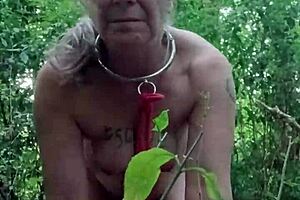 My French maid acts as the petite slave bound in handcuffs for outdoor orgasm play