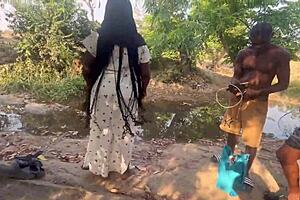 Outside, three studs fuck this shy village ebony girl in rough group sex with big black cock action