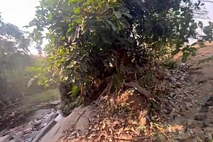 Outside, three studs fuck this shy village ebony girl in rough group sex with big black cock action