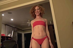 what's intriguing about this chica in a red bikini?