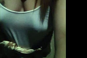 She casually strolled through the public area, showing off her big boobs while walking along.