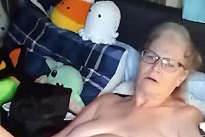 Curvy mature woman performs naked yoga in her room. She spreads legs wide and fingers her saggy tits until orgasm hits.