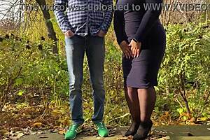 Mother-in-law spreads hairy pussy for outdoor peeing in stockings and heels