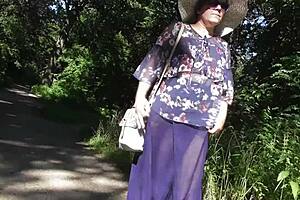 Hairy mature flashes in Aladdin pants at public park