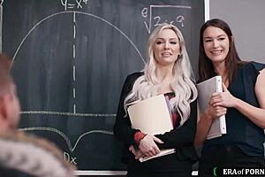 Milf teachers spot a colleague jerking off in the classroom. They join in for threesome blowjobs and deepthroat action.